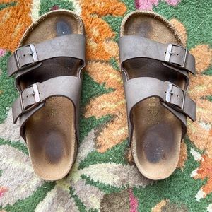 Birkenstock Arizona leather sandals.